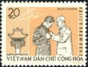 Pres. Ho Chi Minh pinning medal on Titov