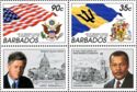 Barbados' and US' flags and arms