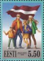 Family and Latvian Flag