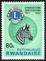 Lions Emblem, Globe and Plains Zebra (Equus quagga)