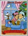 Mickey and Minnie sleeping on a chair