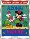 Daisy Duck and Minnie Mouse in grass skirts, Hawaii