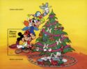 Mickey, Minnie, Goofy, Donald decorating the Christmas tree