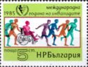 Wheelchair User between Runners