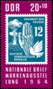 Stamp from 1950: Nuclear Bomb, Hand, and Peace Dove