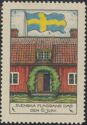Flag, house with wreath around door