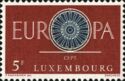 "O" in "EUROPA" as Wagon Wheel with 19 Spokes (Bkgr. maroon)